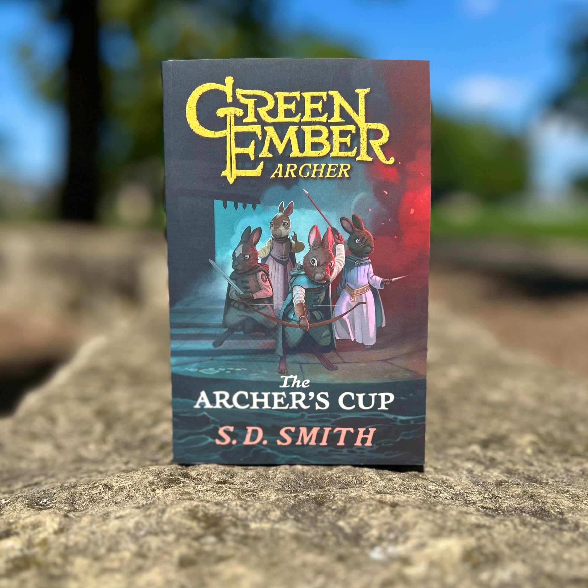 A book titled 'The Archer's Cup' by S. D.
